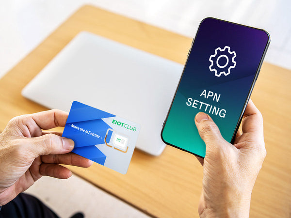 A person holding a smartphone showing 'APN SETTING' and an EIOTCLUB SIM card.